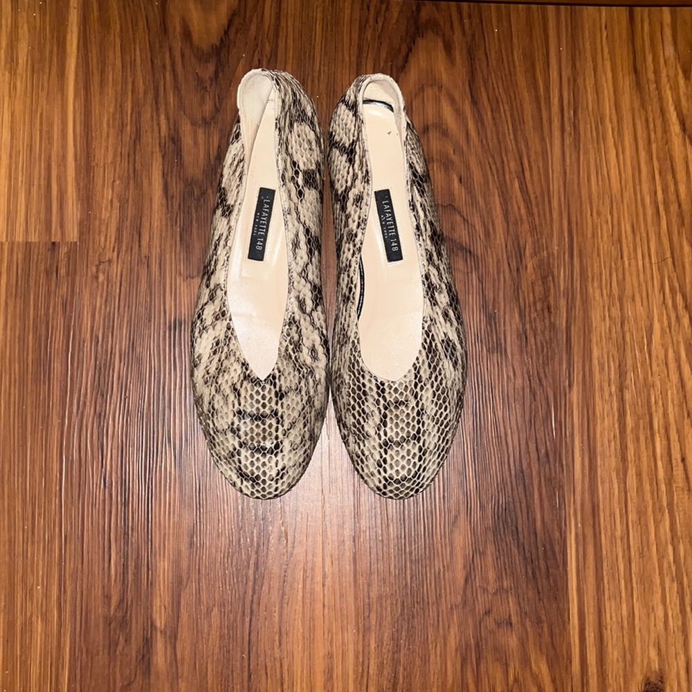 Lafayette sandal. Snake skin! Very comfortable. Can be worn in a casual setting